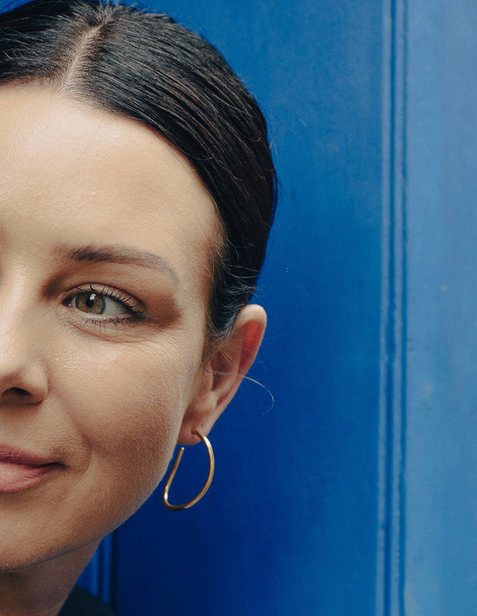 Nordic Muse - Gold Oval Fluid Hoop Earrings